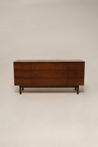Main view of the Mid Century Modern walnut wood 9 drawers dresser by Stanley featuring solid wood construction and sleek design