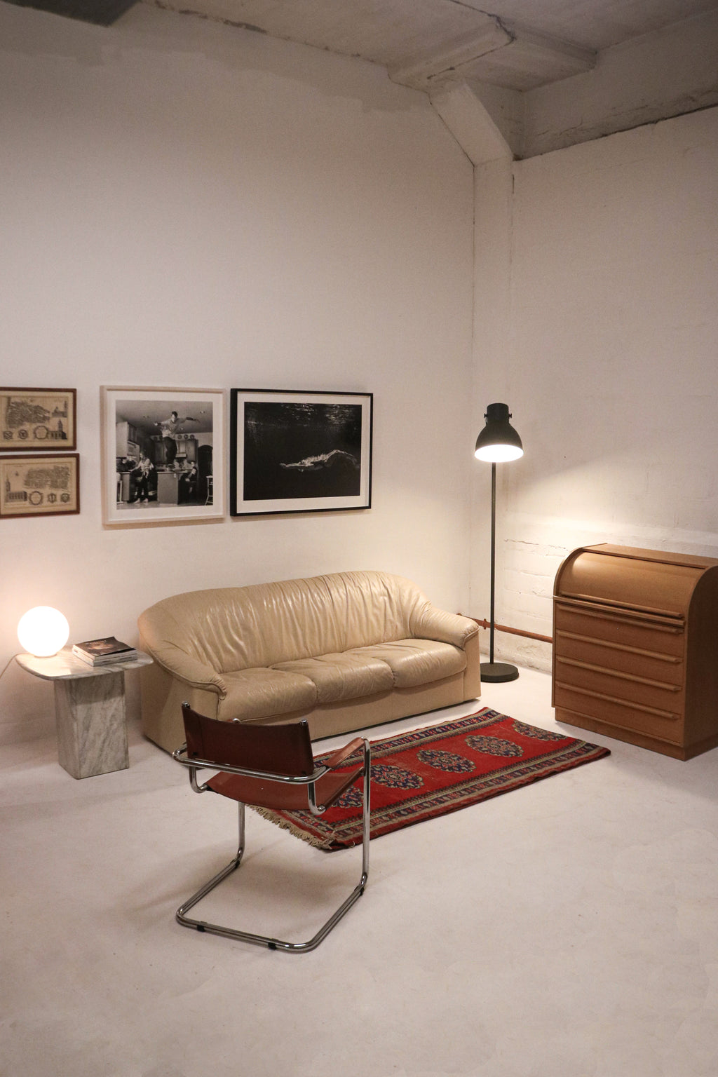 Rear view of both framed maps showing hardware and backing construction