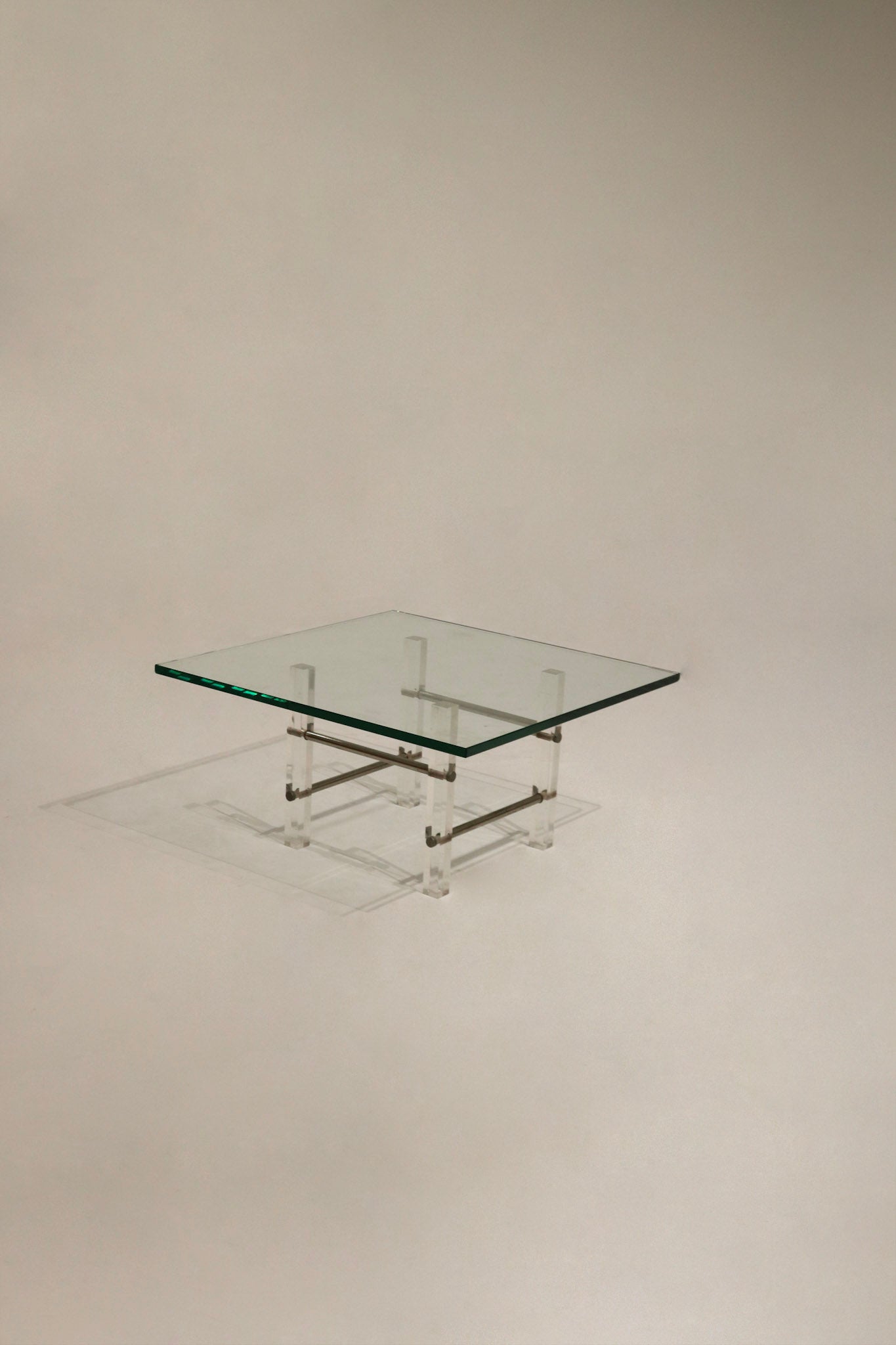 Vintage Lucite and glass coffee table design
