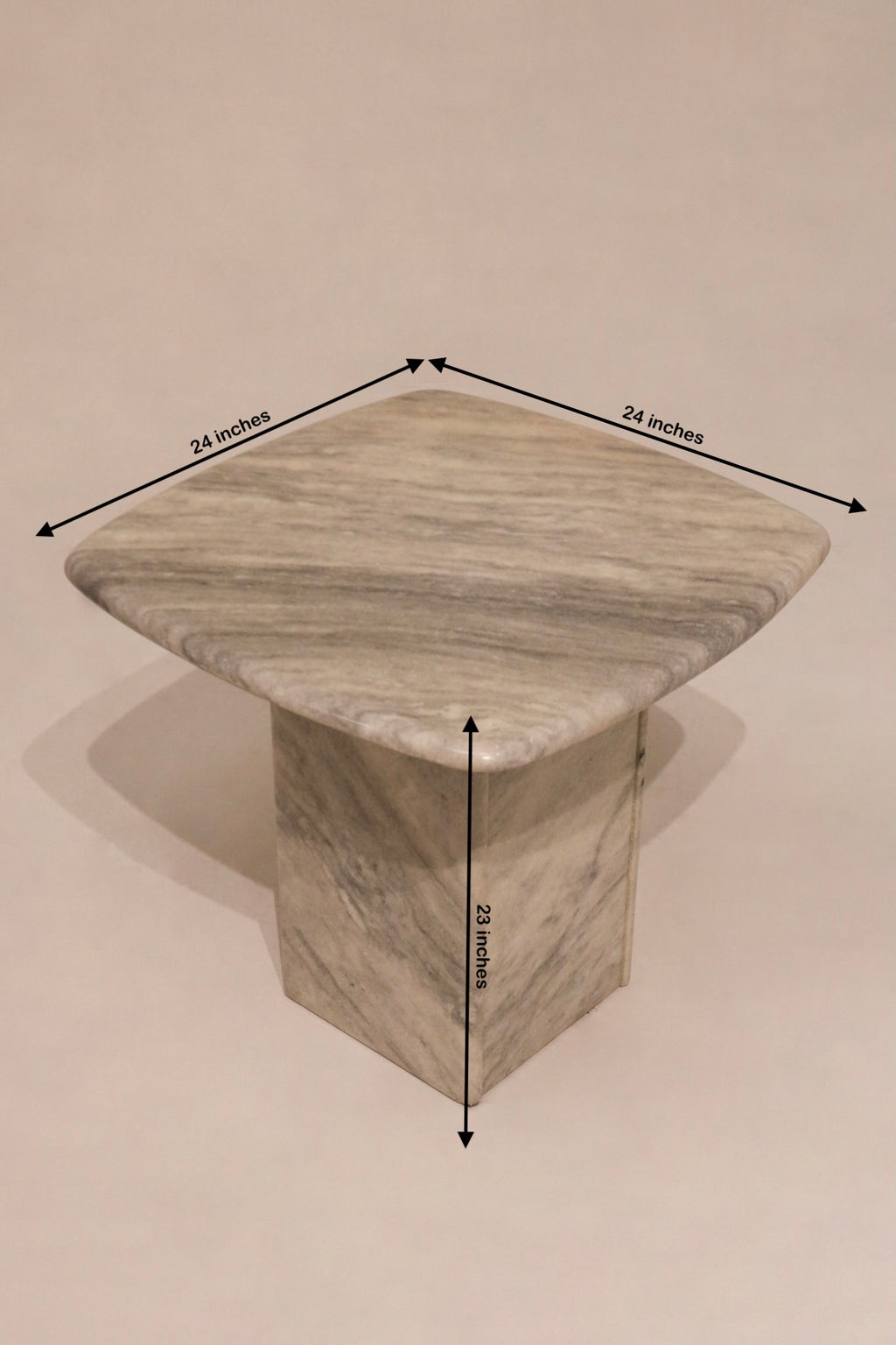 Size reference image of vintage solid stone marble end table showing 24x24x23 inch dimensions