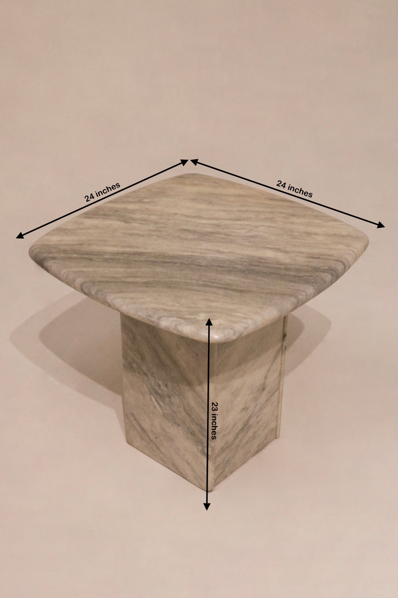 Size reference image of vintage solid stone marble end table showing 24x24x23 inch dimensions