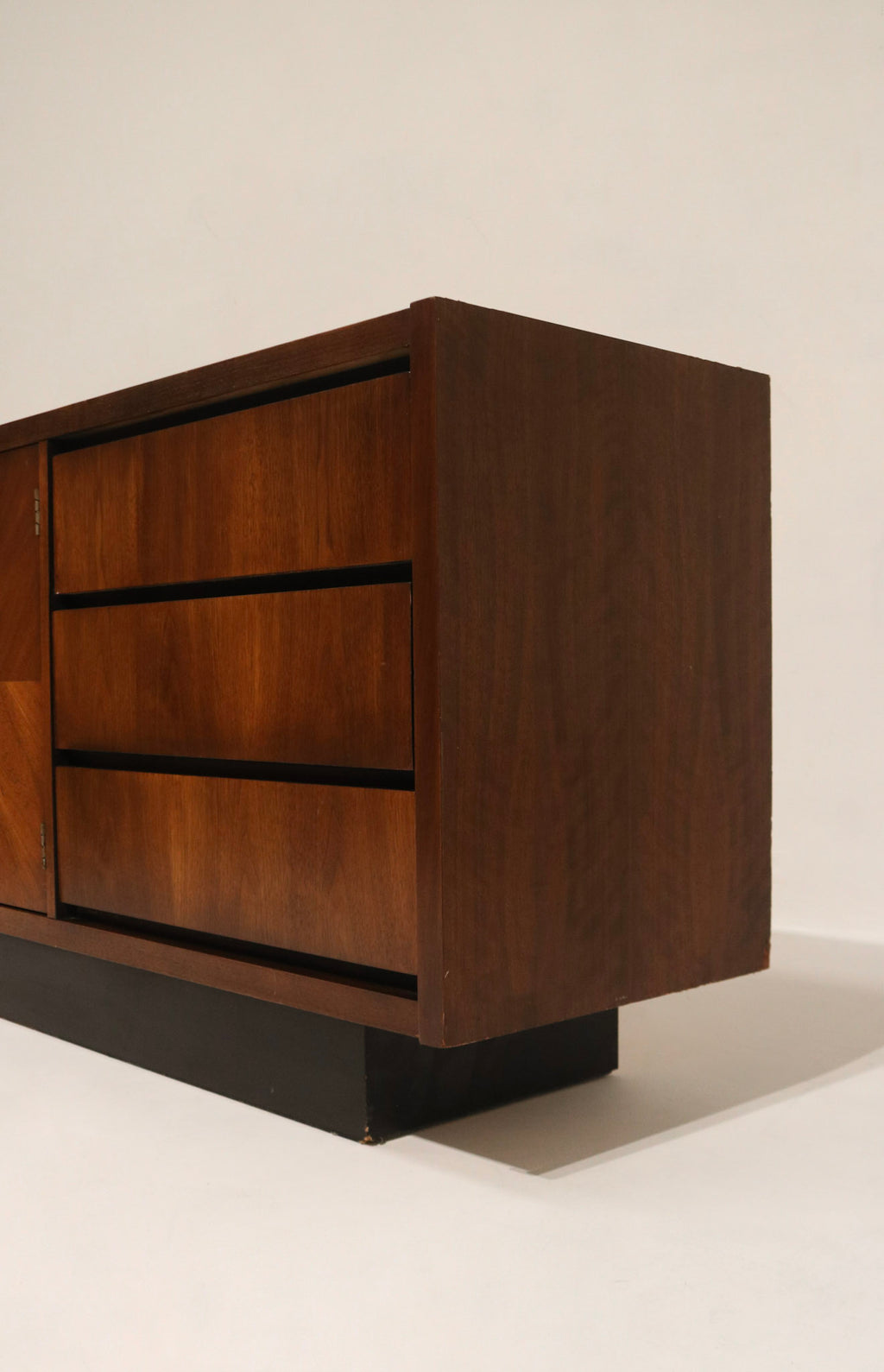Full profile shot emphasizing long length and low height, stable base and substantial weight typical of Lane walnut credenza