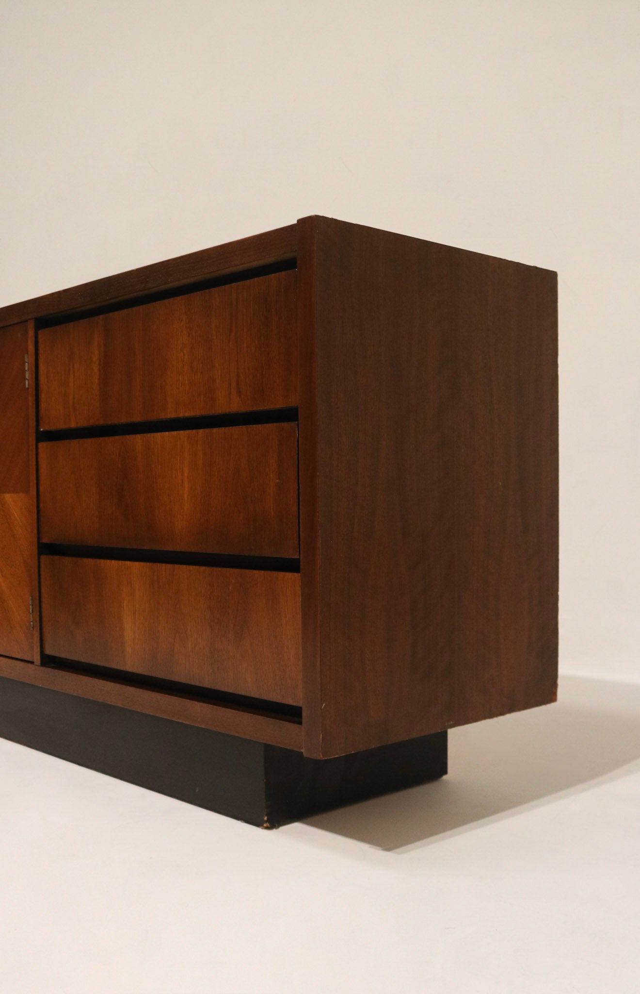 Full profile shot emphasizing long length and low height, stable base and substantial weight typical of Lane walnut credenza