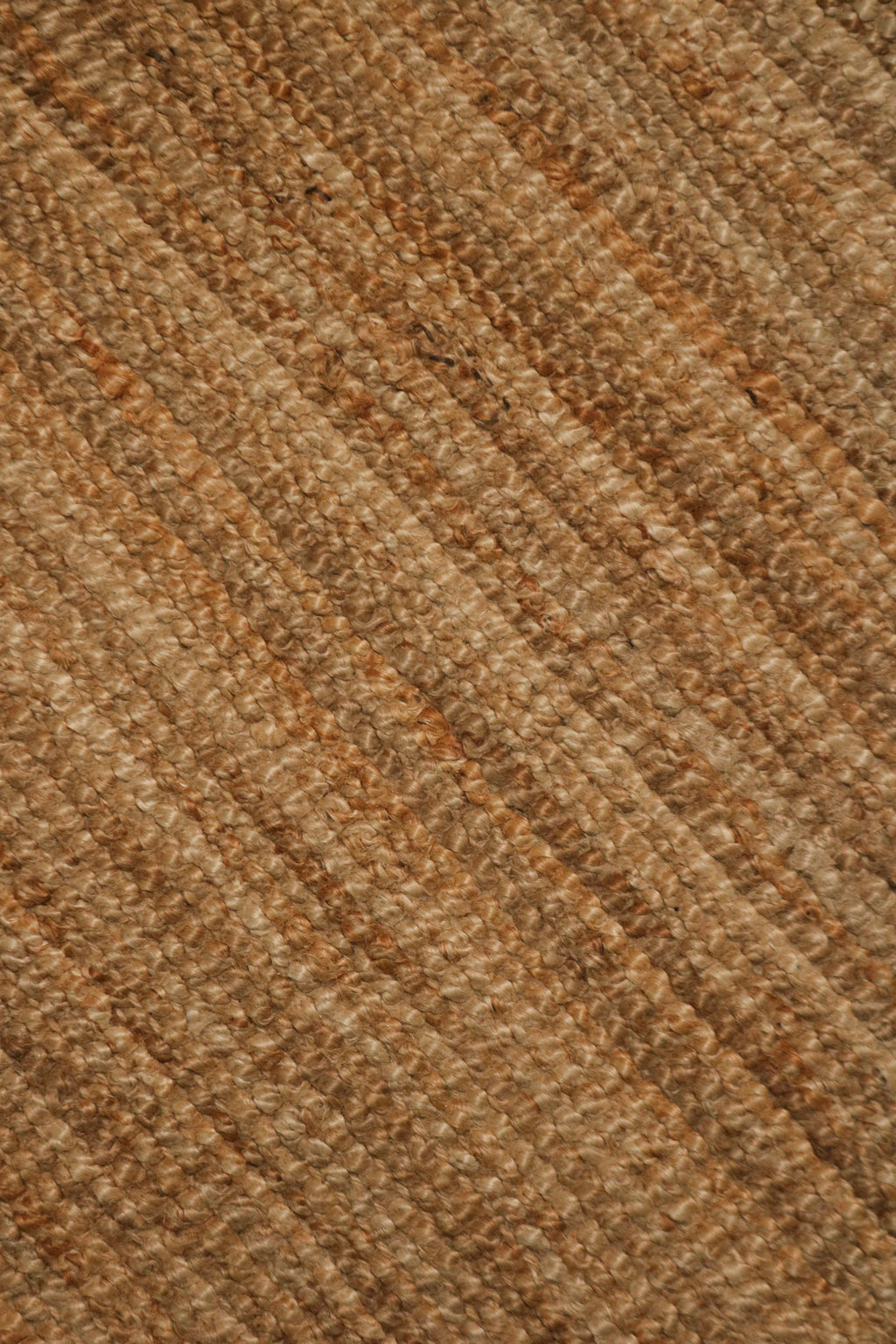 Detailed shot of the rug's neatly finished edge stitching, showcasing quality craftsmanship and weave