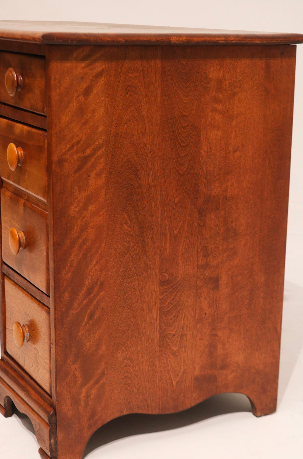 Close-up of age stain on top surface giving authentic vintage character to maple wood