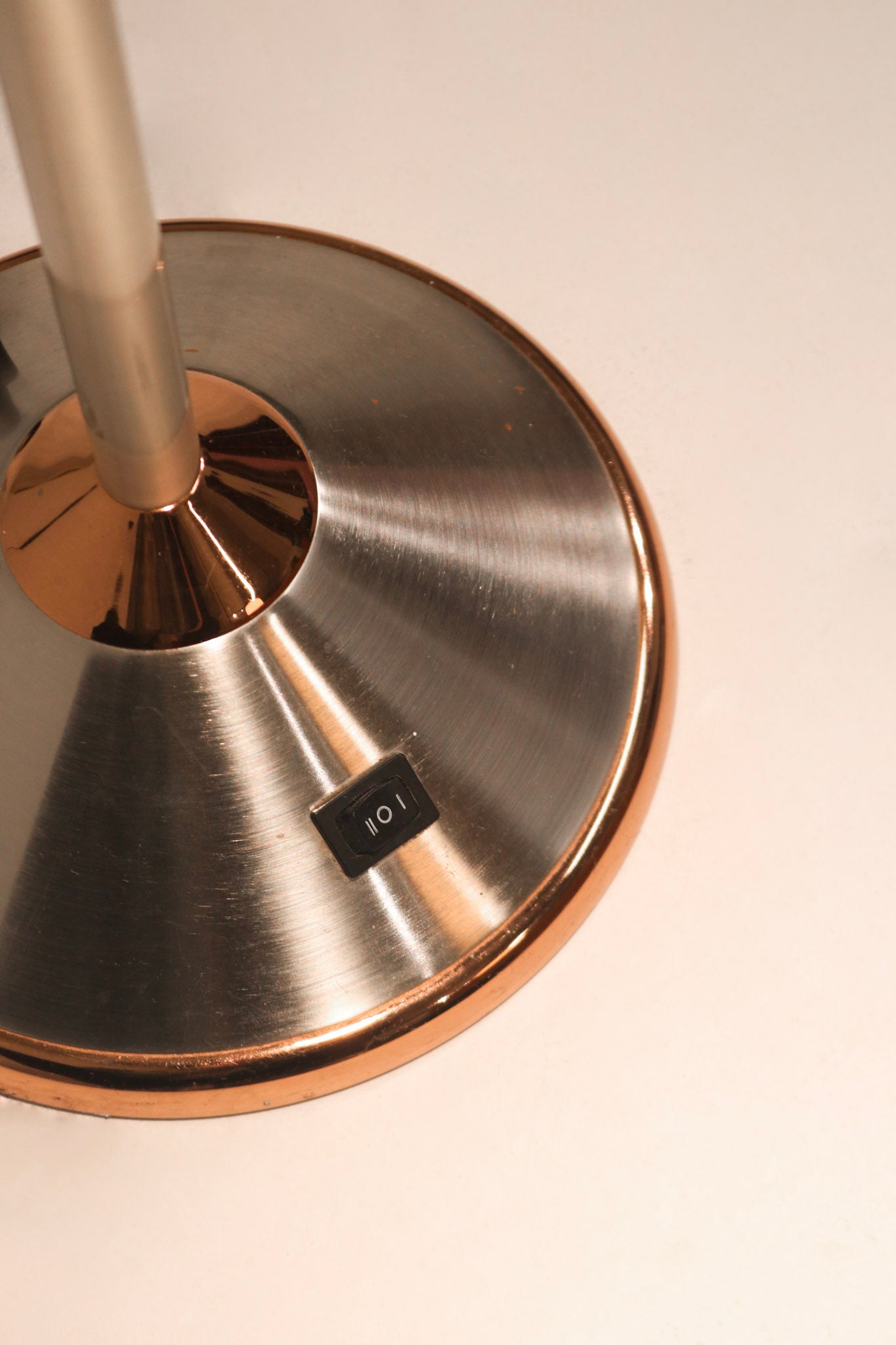 Top-down view of lamp head highlighting internal chrome construction and vintage patina