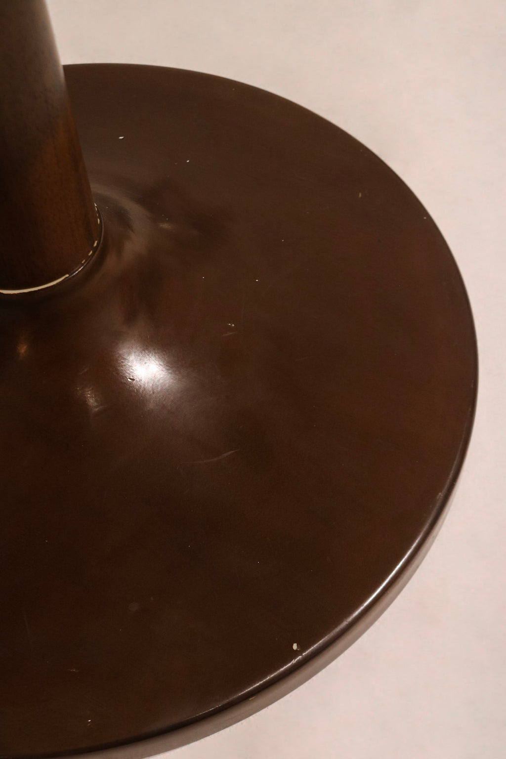 Detail of wooden table base construction highlighting solid wood and craftsmanship