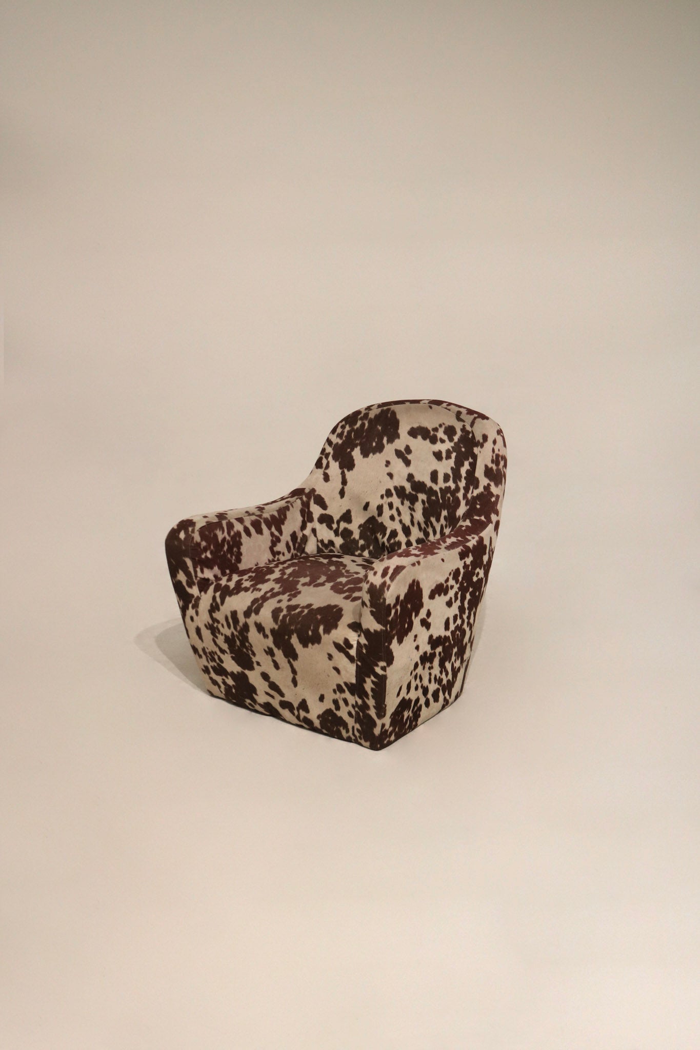 Main view of Contemporary Cow Print Club Arm Chair with polyester fabric upholstery, black and white cow pattern and full profile
