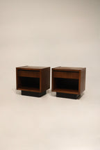 Main view: Pair of MCM walnut wood nightstands by Lane, full frontal shot showing walnut grain, tapered legs and mid-century silhouette