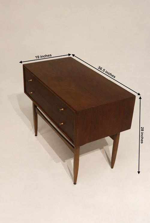 Close-up of drawer from vintage walnut and teak furniture