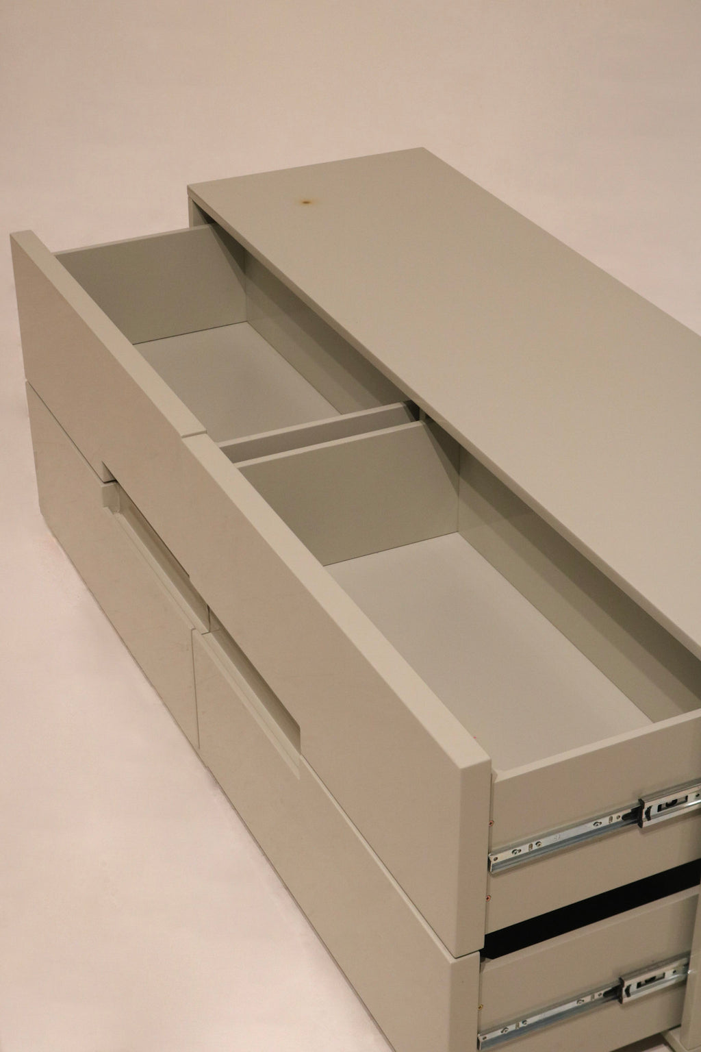 Perspective view showing all drawers partially open for storage capacity display