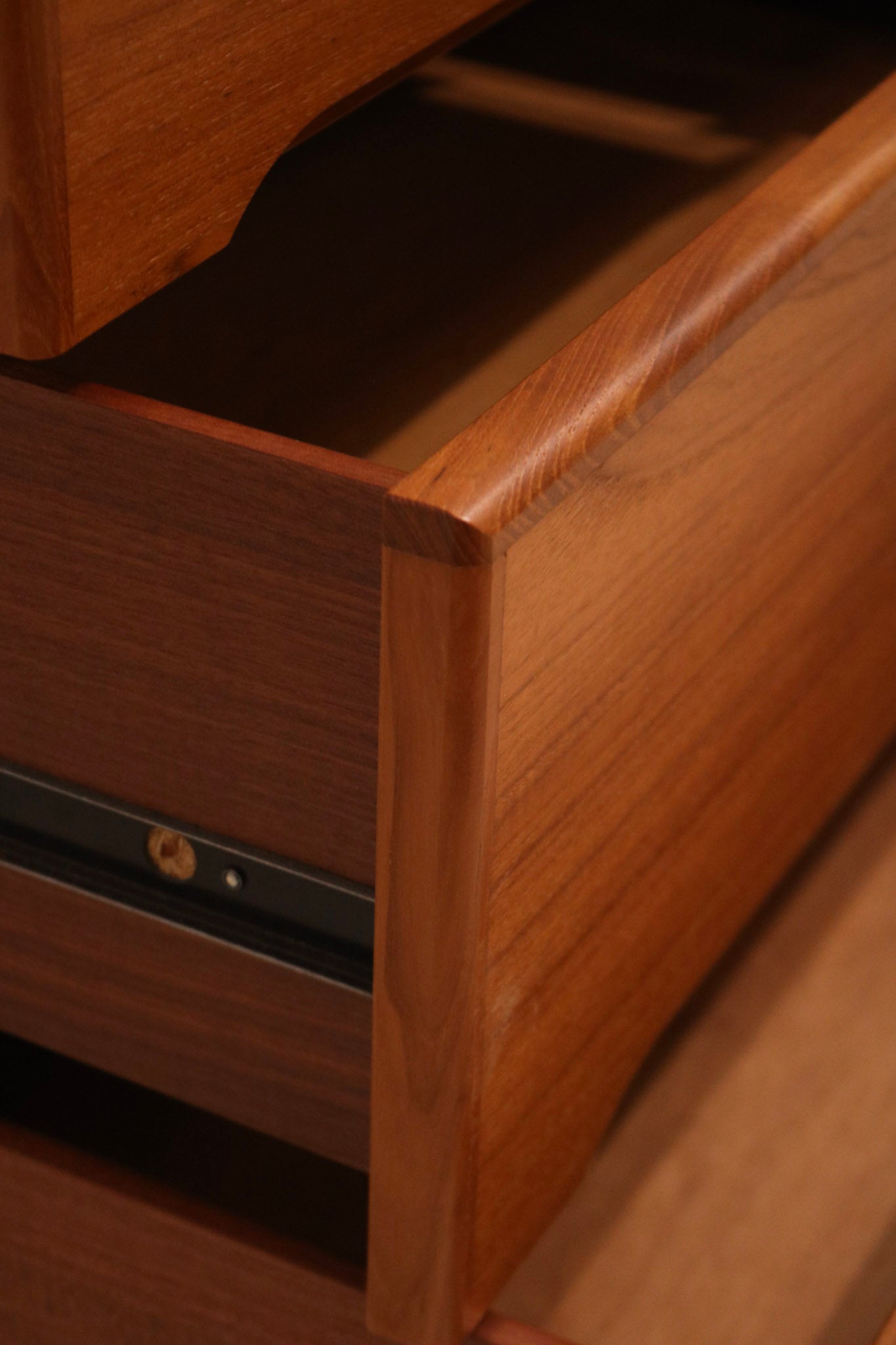 Angle close-up of drawer alignment and precision craftsmanship of the Danish piece