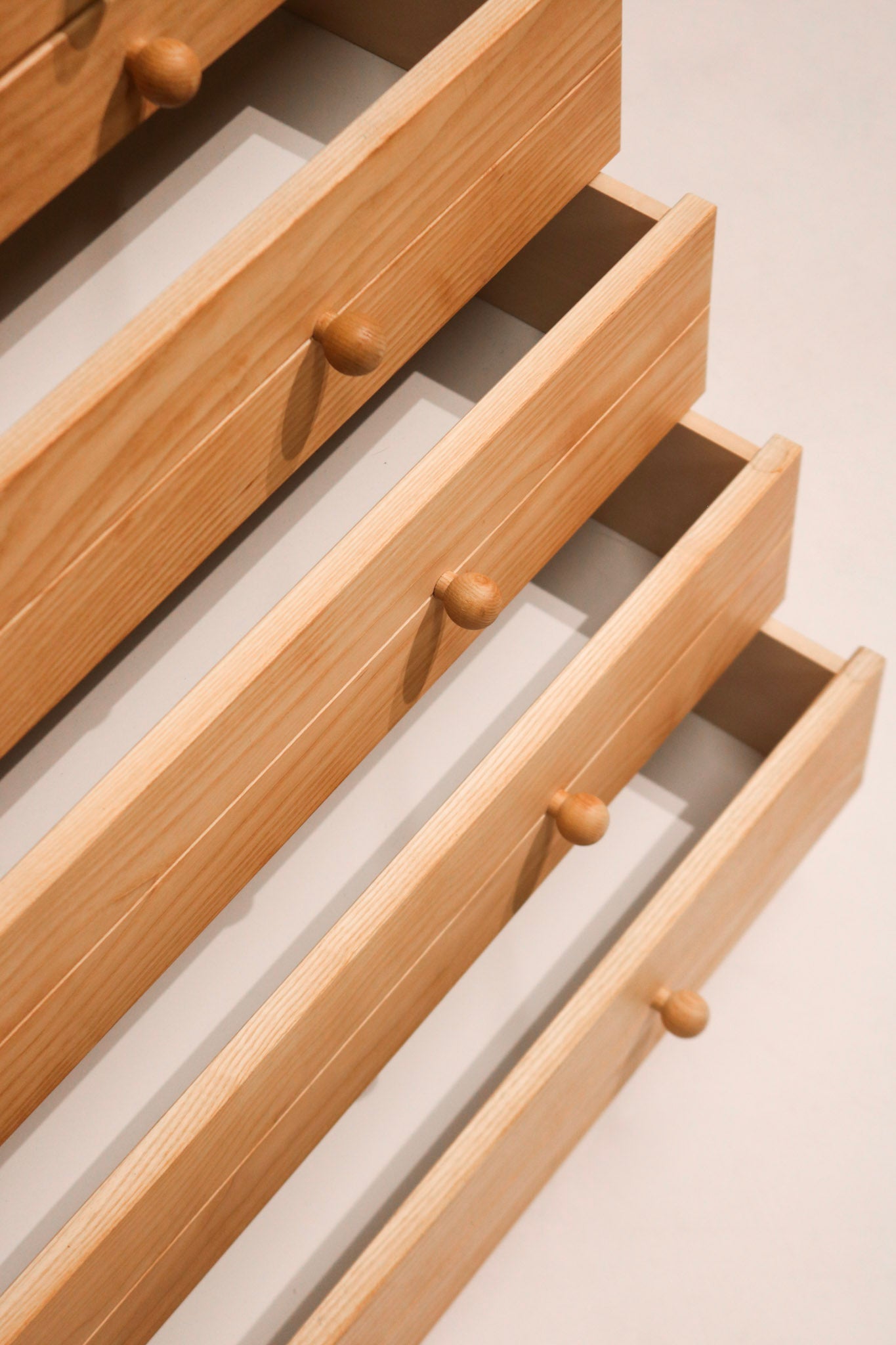 Side angle of the Scandinavian pine dresser showing mid-century modern profile