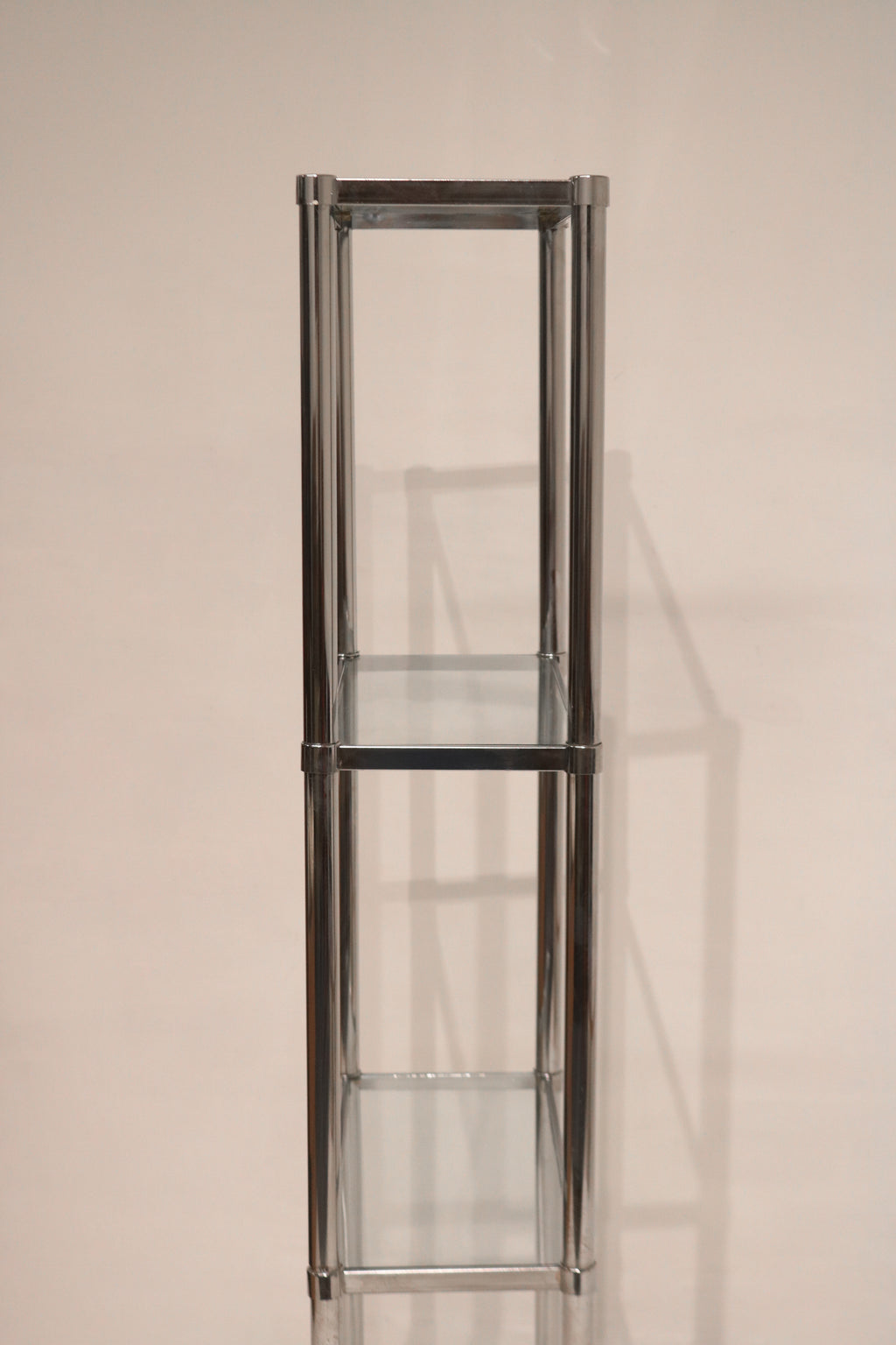 Glass shelf detail on Vintage Steel Bookcase showing thickness and clean edges