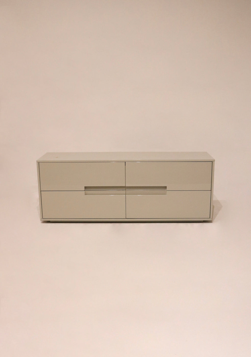 Main view of Modern CB2 Low Dresser Console in lacquered oat wood, full front perspective