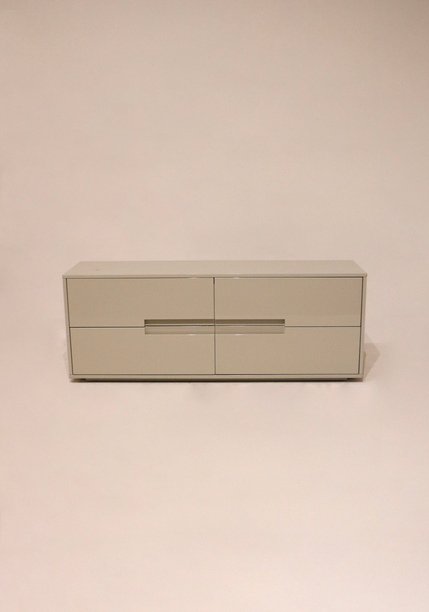 Main view of Modern CB2 Low Dresser Console in lacquered oat wood, full front perspective