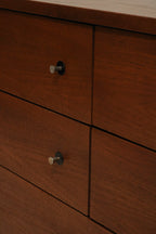 Angle view showcasing the mid-century modern style lines and rich walnut color