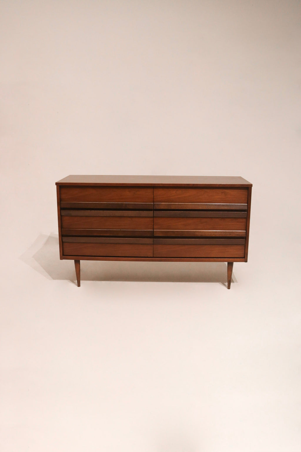 Interior of drawer showing clean wood craftsmanship and smooth glide function