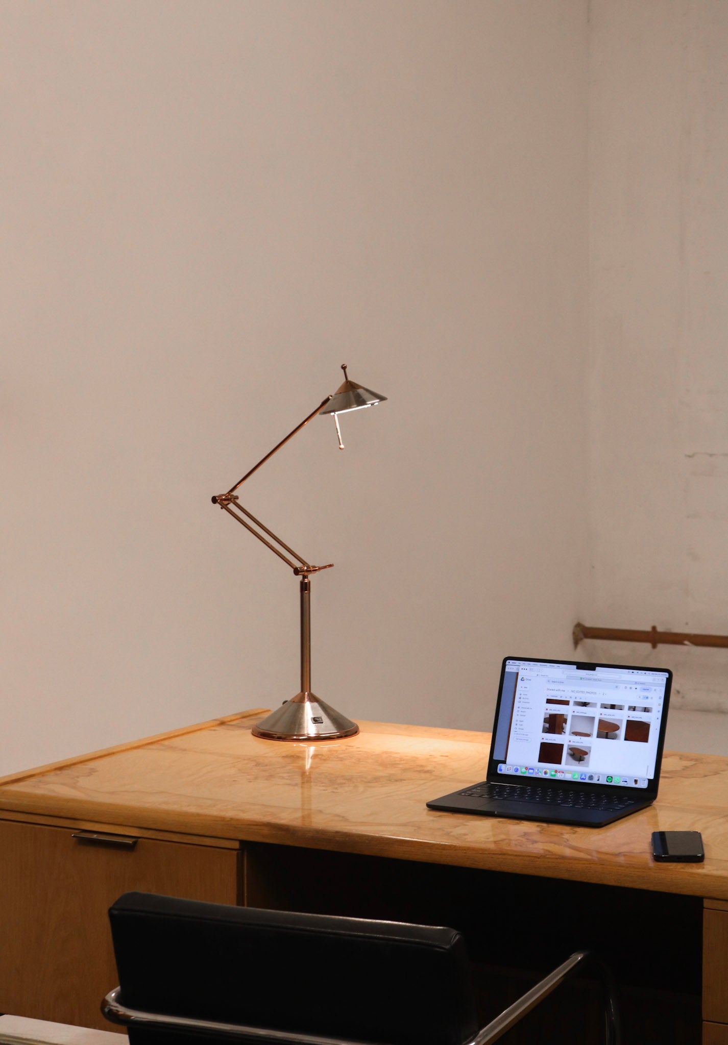 Side profile of Vintage Chrome Adjustable Desk Lamp emphasizing its steel frame and design