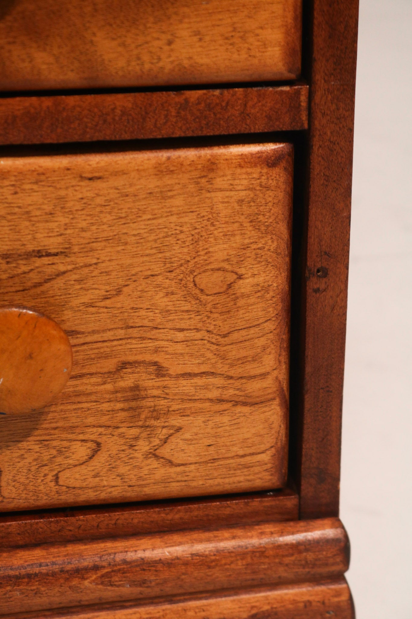 Bottom view revealing desk leg structure and hardwood frame condition