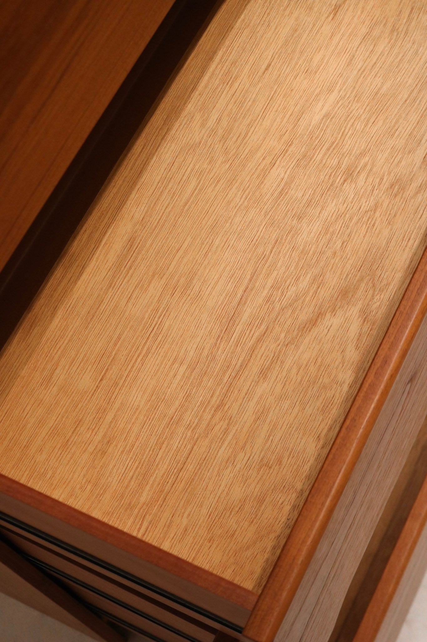 Top view showcasing rich teak wood finish and craftsmanship of MCM dresser