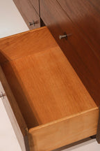 Close-up of rich walnut finish texture showcasing natural grain patterns and variation