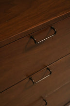 Top edge detail showing tiny marks and surface wear that are not very noticeable on walnut finish