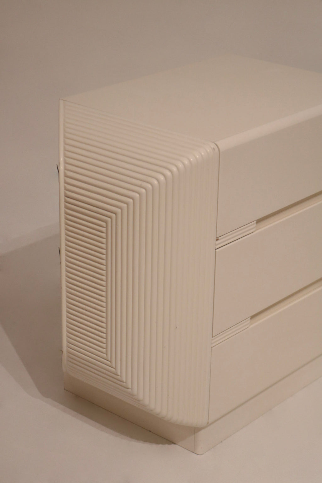 Zoom on glossy lacquered surface texture and clean white finish