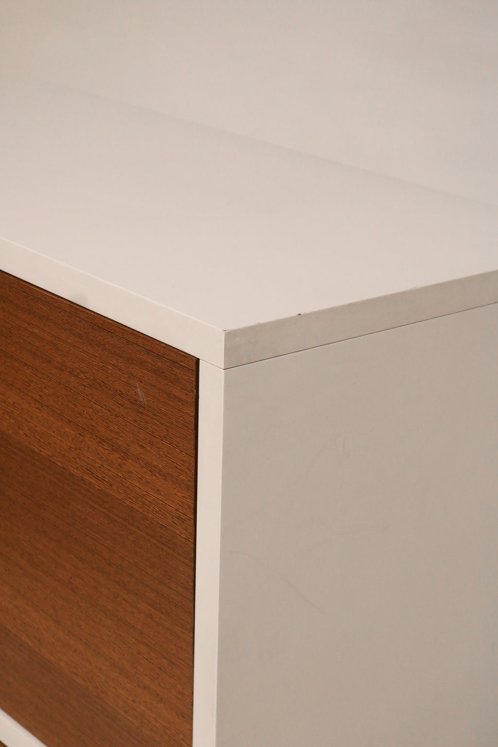 Interior view of cabinet with adjustable wooden shelves and spacious compartments