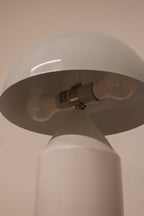 Close-up of lamp hardware showing the light socket and secure metal connections