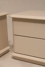 Angled view of nightstands showing dual units side-by-side and chrome hardware
