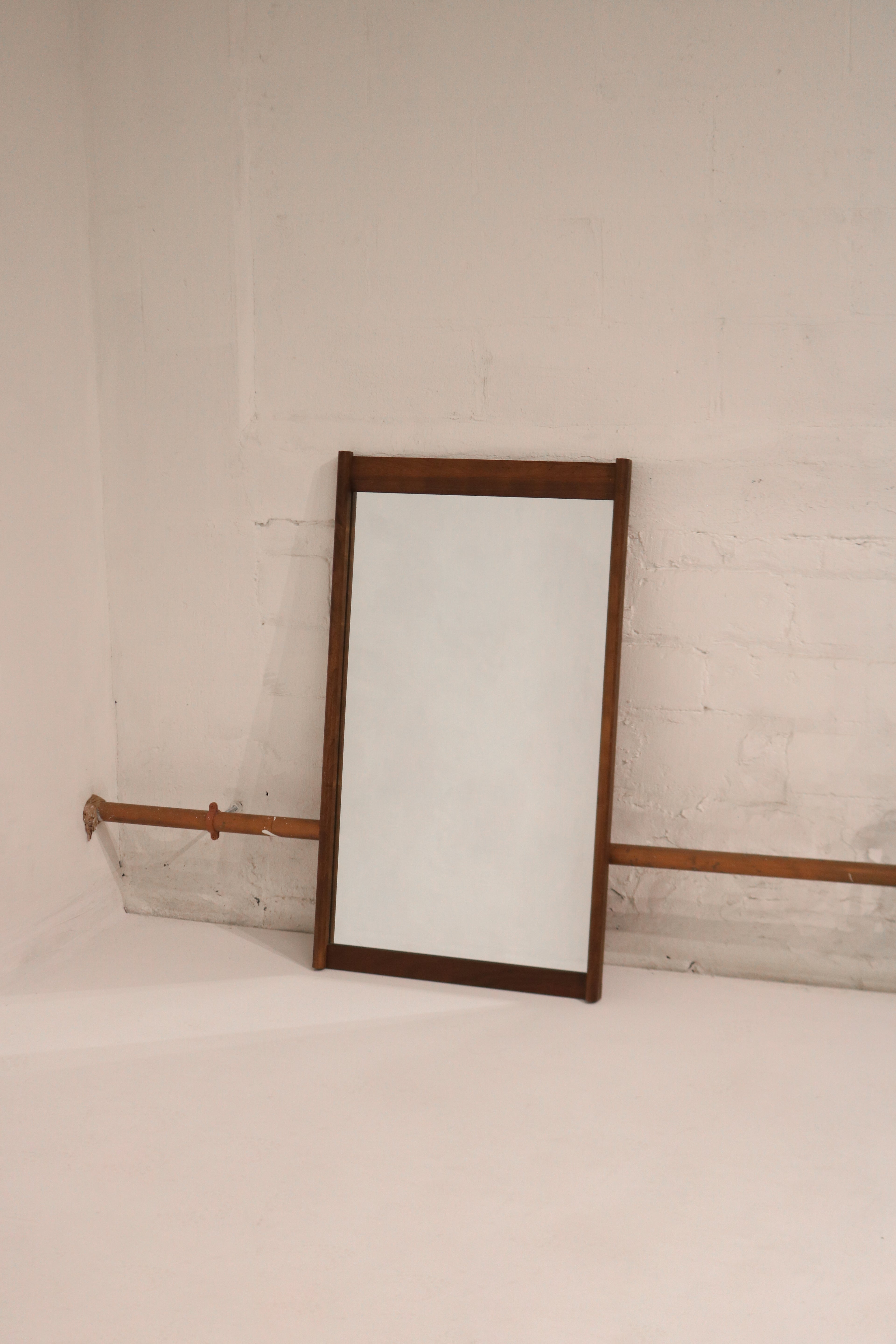 Main view of Vintage Walnut Wood Wall Mirror showing full solid walnut frame and reflective glass surface