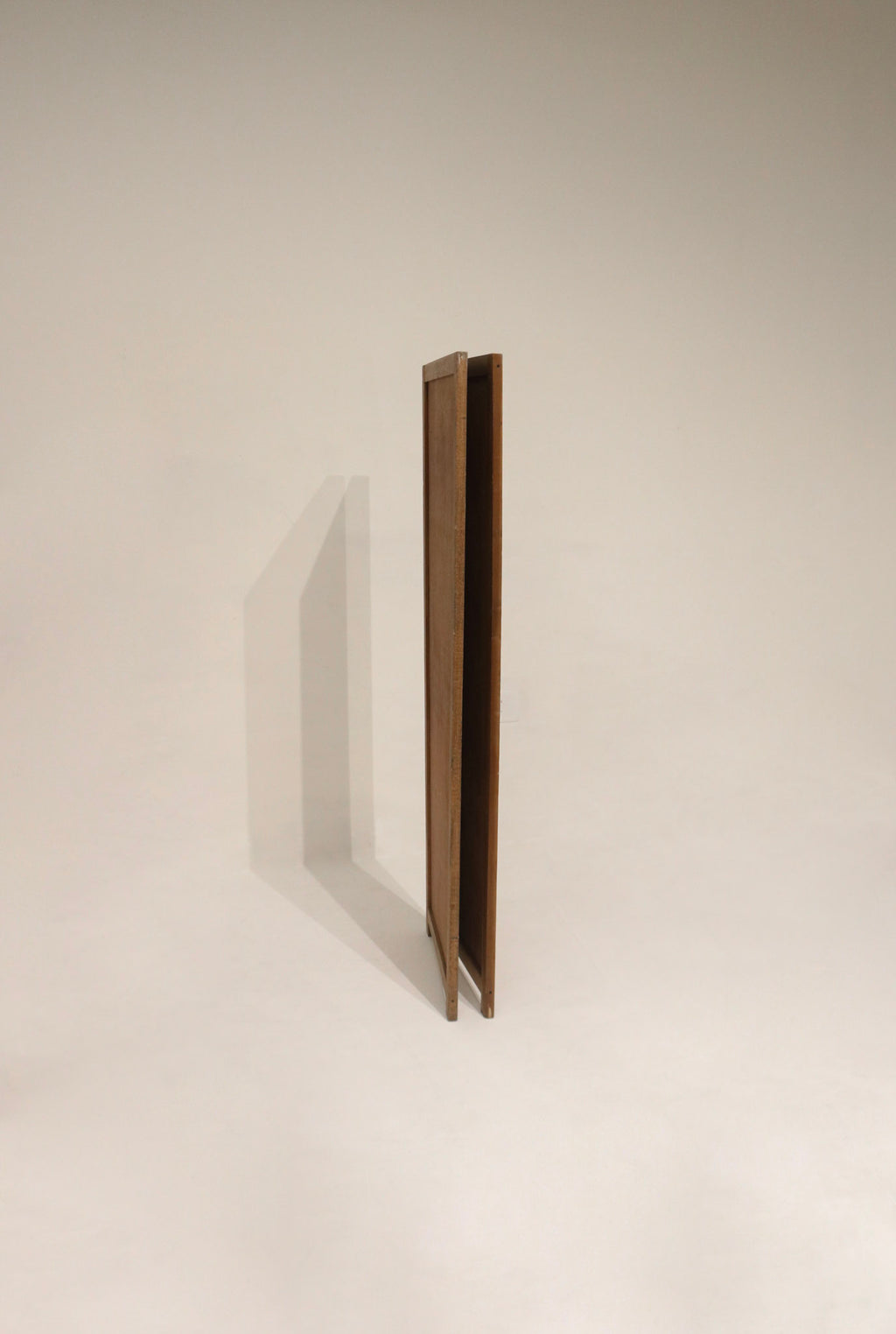 Close-up of pine wood finish showing aged patina, minor surface scratches, visible grain and original joinery details.