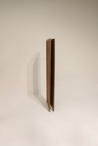 Close-up of pine wood finish showing aged patina, minor surface scratches, visible grain and original joinery details.