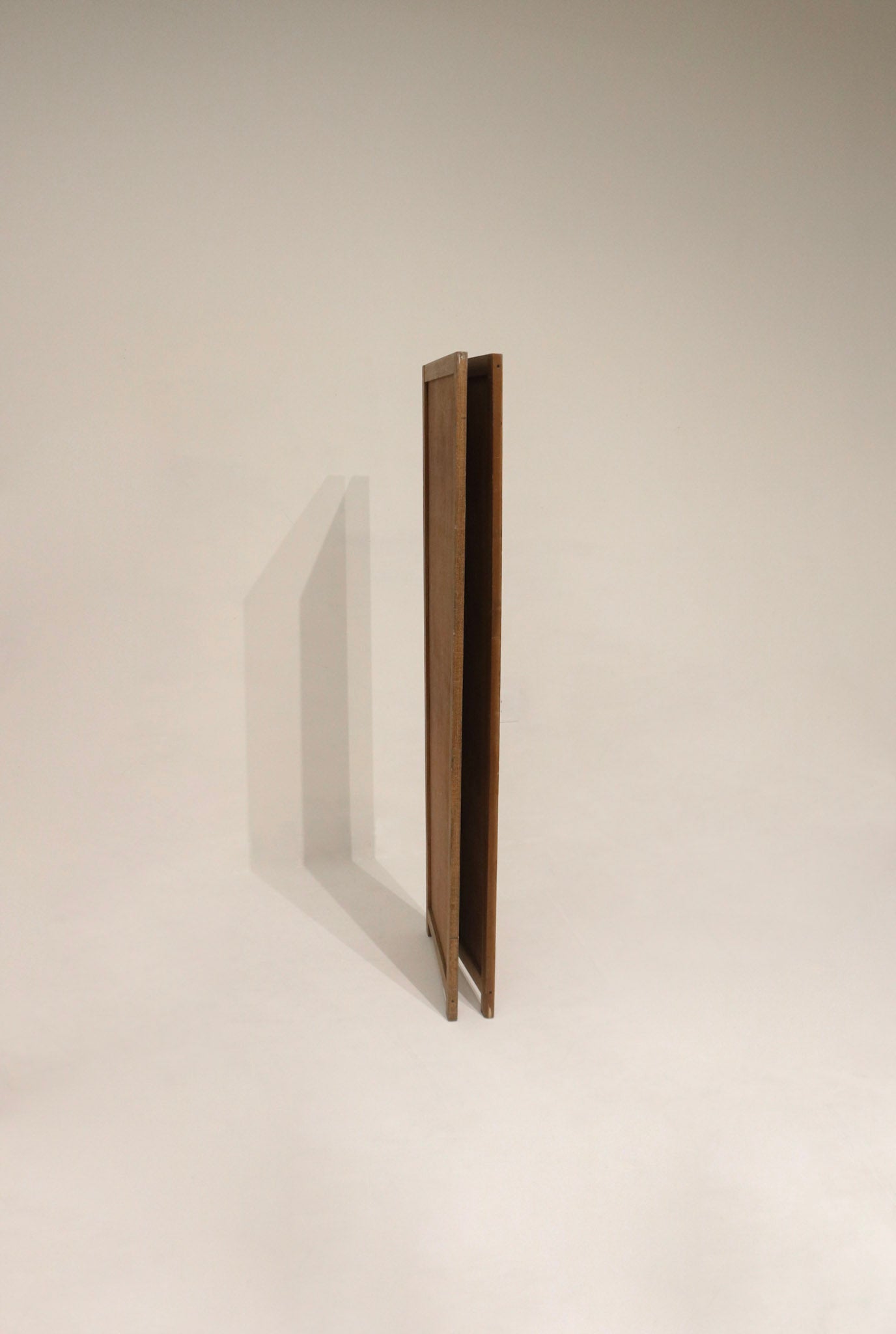 Close-up of pine wood finish showing aged patina, minor surface scratches, visible grain and original joinery details.