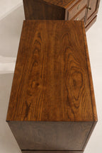 Detailed view of wood veneer pattern and drawer front on Thomasville nightstand, highlighting walnut veneer accents and mid-century craftsmanship. Perfect for NYC apartments.