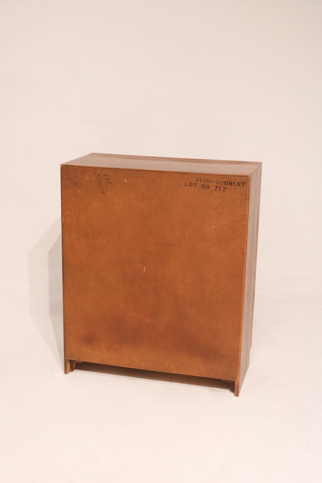 Drawer handles close-up showing minimalist hardware in walnut wood finish