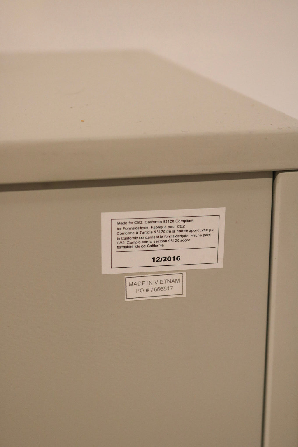 Close-up of dresser top in lacquered oat wood showing smooth surface and premium finish
