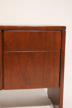 Detailed shot of left leg support showing mid-century style structure in wood