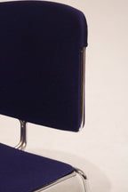 Close-up of backrest with the textured blue fabric and clean seams