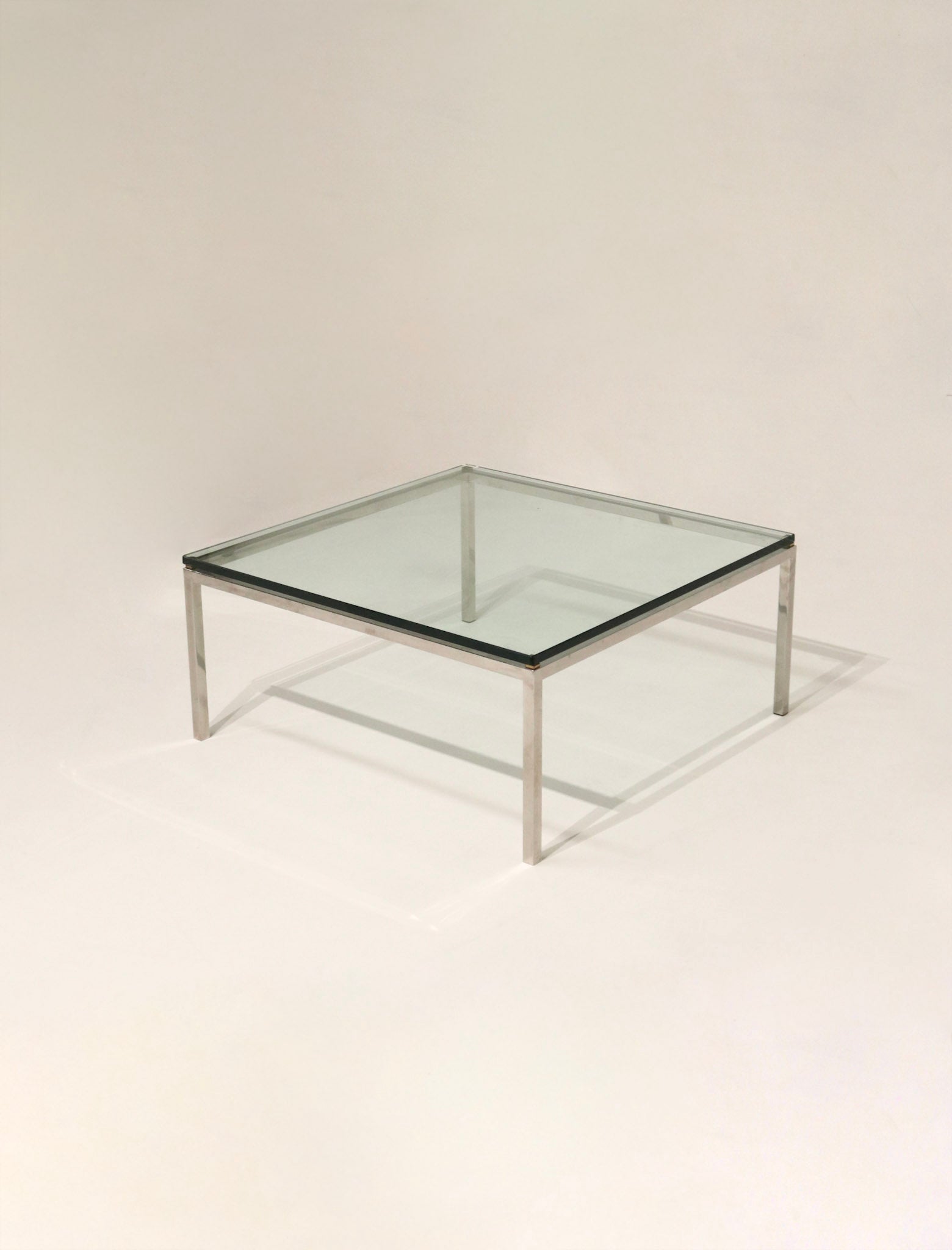 Vintage chrome and glass table view from the side