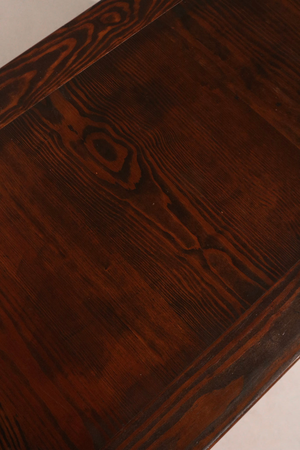 Close-up of drawer interior revealing clean storage space and solid oak build