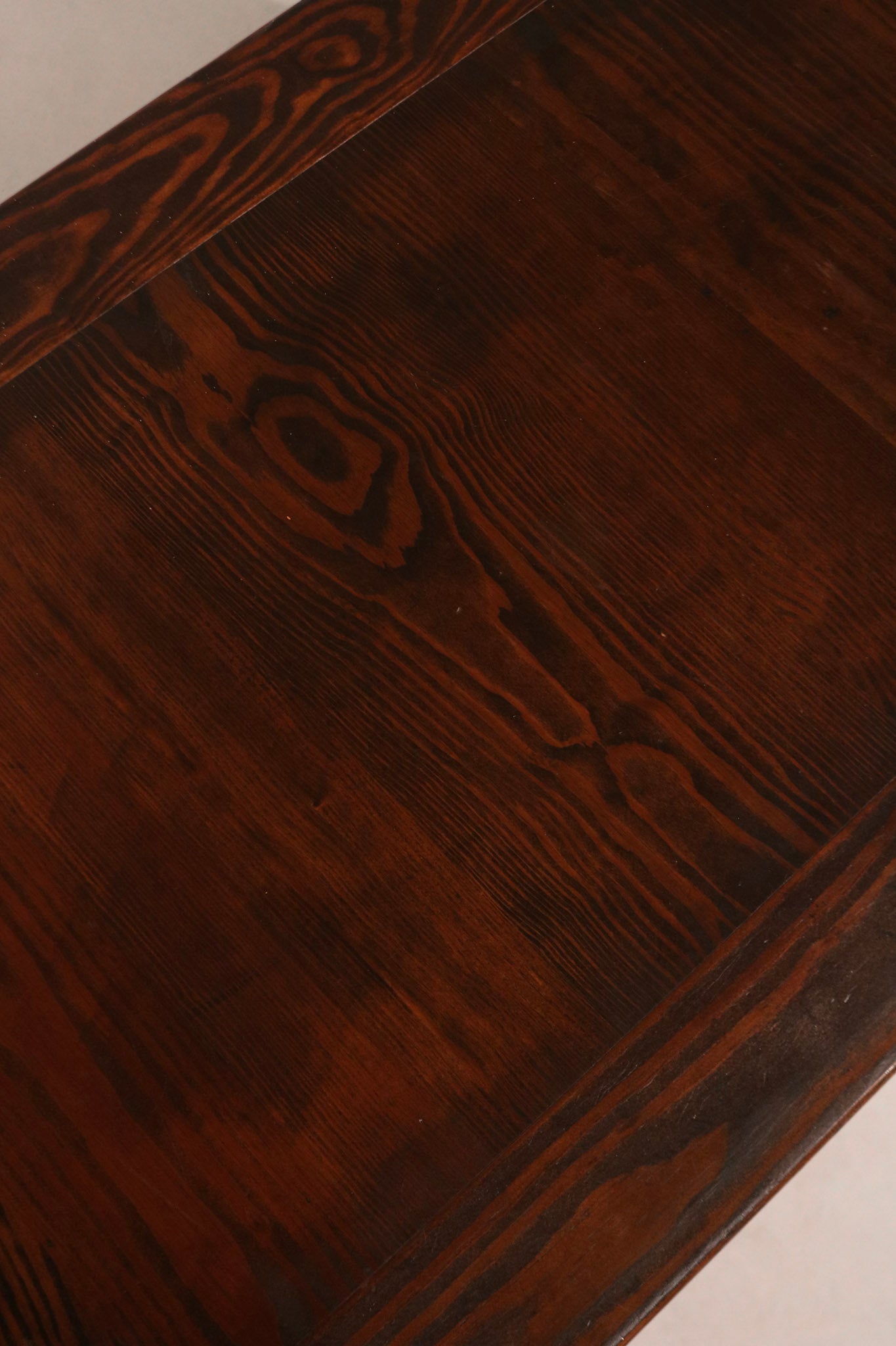 Close-up of drawer interior revealing clean storage space and solid oak build