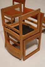 Rear view of Jasper chair showing light oak slatted back, visible wood grain and subtle aged patina consistent with vintage pieces.