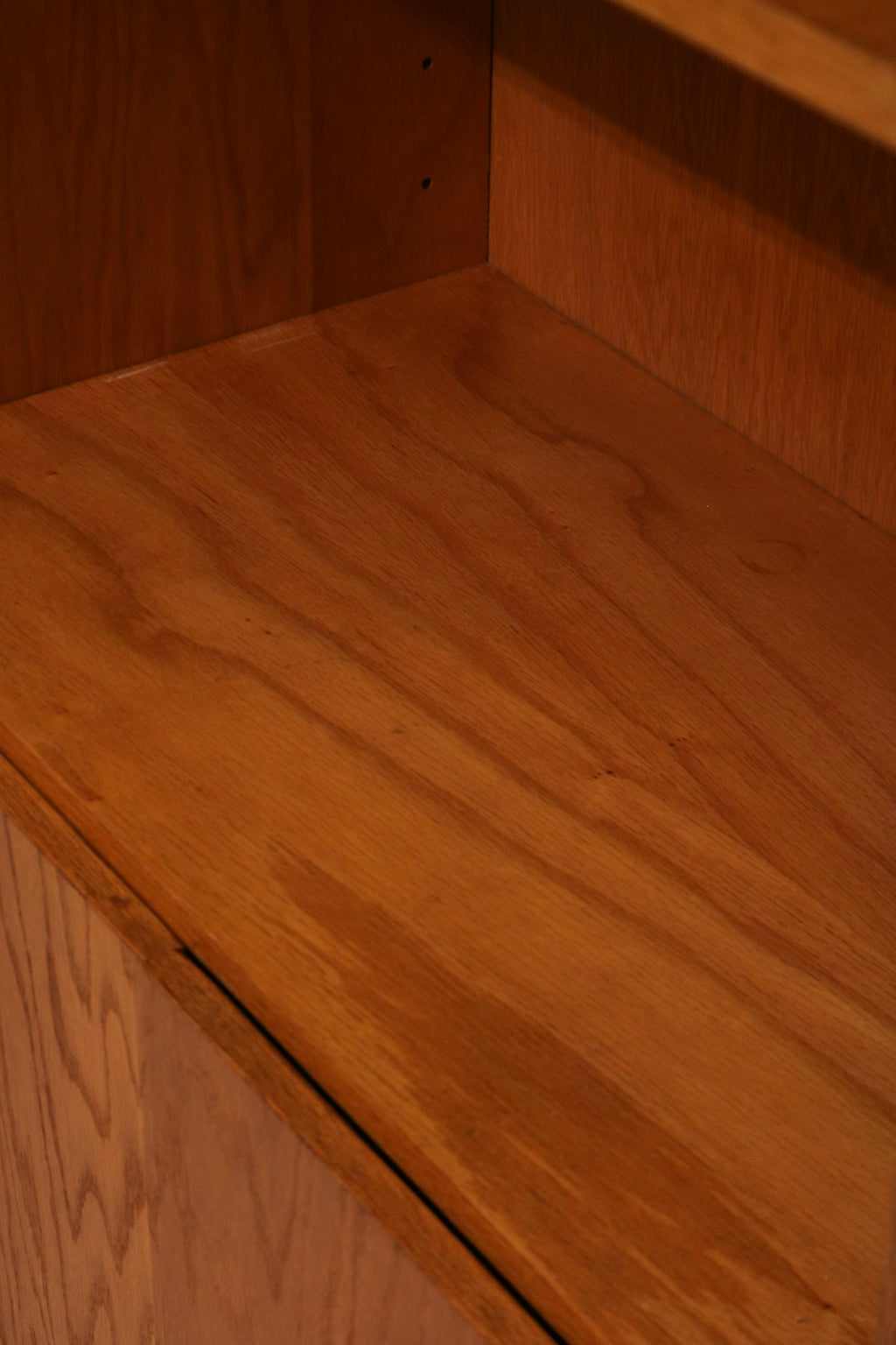 Close-up of corners and joints on the Mcm oak wood bookshelf showing clean lines and durability