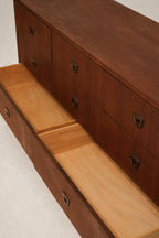 Top drawer open showing smooth sliding function and solid wood interior
