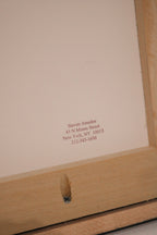 Artist signature close-up from Martin Schoeller displayed on the bottom corner of the artwork