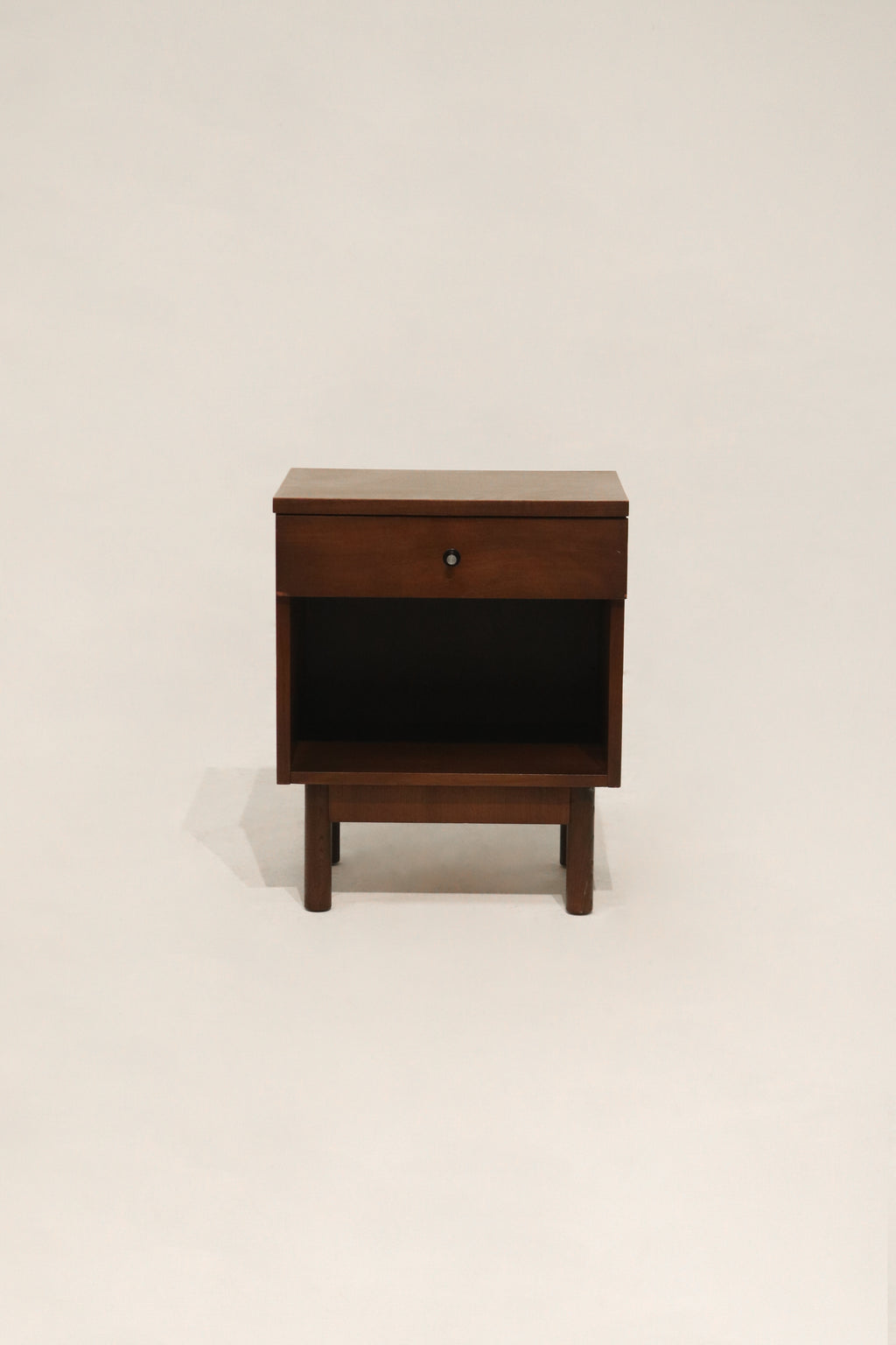 Main view of Vintage Mcm Walnut Wood Nightstand Bedside Table made of solid walnut and veneer top