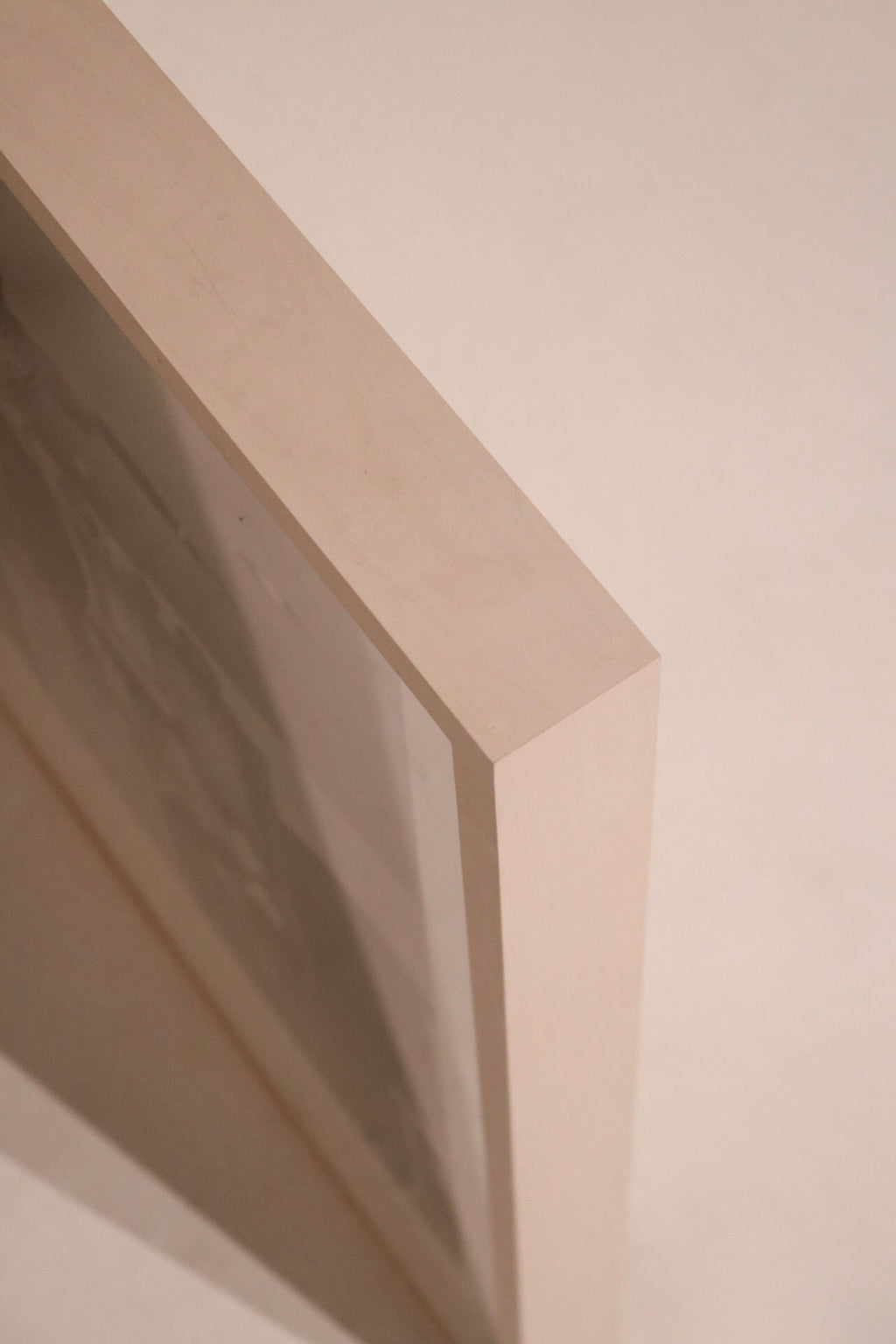 Angle view showing the gloss and finish of framed photography by Martin Schoeller