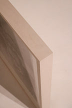 Angle view showing the gloss and finish of framed photography by Martin Schoeller